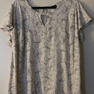 Torrid Cream and Black Bow Print Blouse